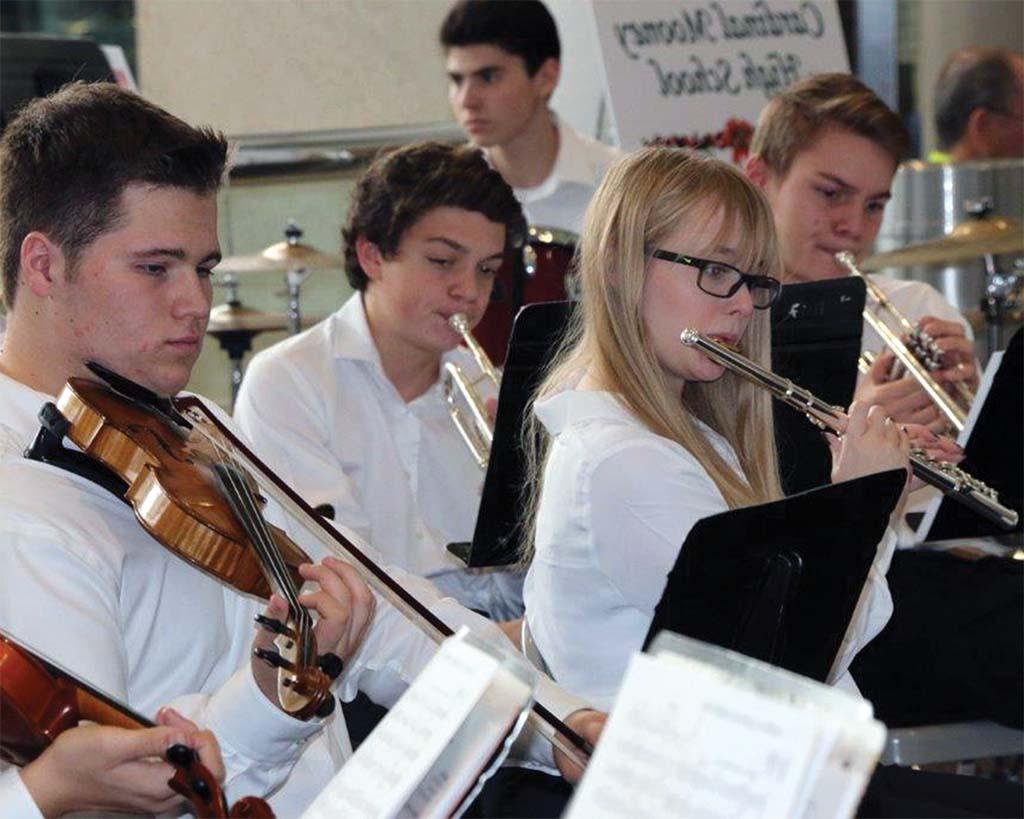 Carousel of students performing music